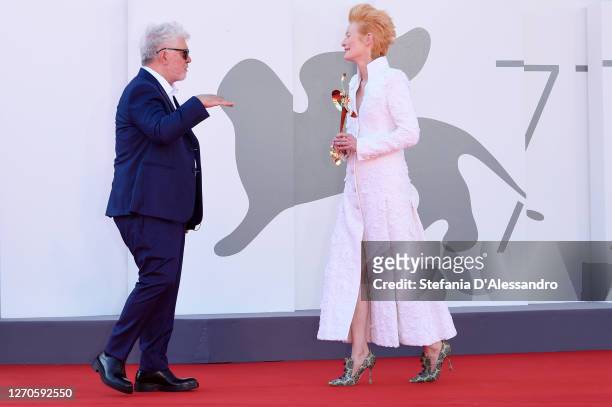 Pedro Almodovar and Tilda Swinton walk the red carpet ahead of the movie "The Human Voice" at the 77th Venice Film Festival at on September 03, 2020...