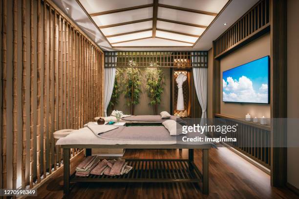 modern spa massage room - massage table no people stock pictures, royalty-free photos & images