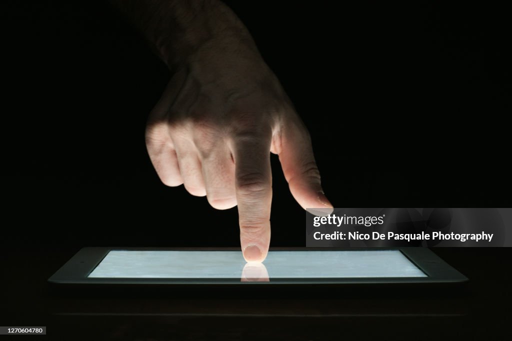Man using digital tablet