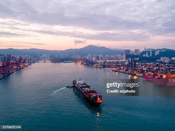 aerial photography of the night view of tsing yi pier in hong kong - commercial dock stockfoto's en -beelden