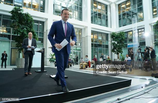 Health Minister Jens Spahn departs after speaking to the media following a virtual meeting with other EU health ministers and officials as part of...