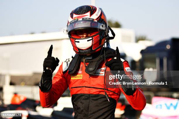 Pole position qualifier Callum Ilott of Great Britain and UNI-Virtuosi Racing celebrates in parc ferme during qualifying for the Formula 2...