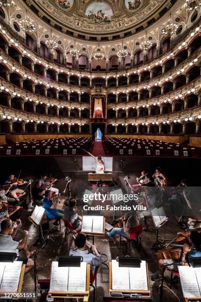 The orchestra of the Teatro Massimo Vincenzo Bellini of Catania conducted by Claudia Patanè during rehearsals of Mozart's Idomeneo at the Teatro...