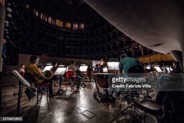 The orchestra of the Teatro Massimo Vincenzo Bellini of Catania conducted by Claudia Patanè during rehearsals of Mozart's Idomeneo at the Teatro...