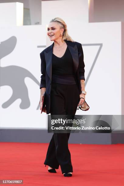 Paola Barale walks the red carpet ahead of the movie "Padrenostro" at the 77th Venice Film Festival at on September 04, 2020 in Venice, Italy.