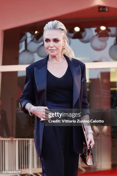 Paola Barale walks the red carpet ahead of the movie "Padrenostro" at the 77th Venice Film Festival at on September 04, 2020 in Venice, Italy.