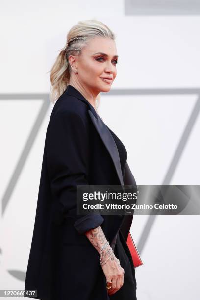 Paola Barale walks the red carpet ahead of the movie "Padrenostro" at the 77th Venice Film Festival at on September 04, 2020 in Venice, Italy.