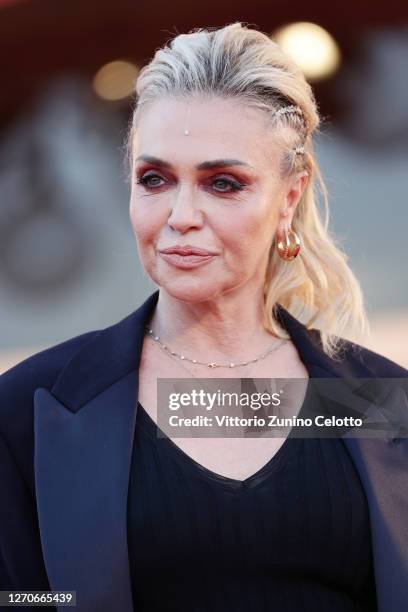 Paola Barale walks the red carpet ahead of the movie "Padrenostro" at the 77th Venice Film Festival at on September 04, 2020 in Venice, Italy.