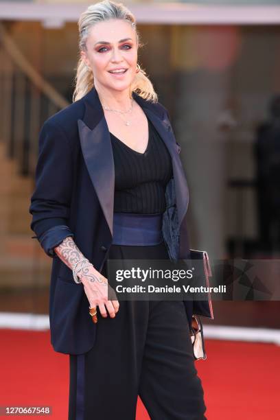 Paola Barale walks the red carpet ahead of the movie "Padrenostro" at the 77th Venice Film Festival at on September 04, 2020 in Venice, Italy.