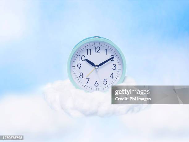 clock on a cloud - second chance stock pictures, royalty-free photos & images