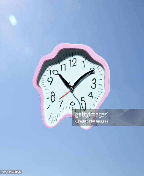 melting clock - urgency clock stock pictures, royalty-free photos & images