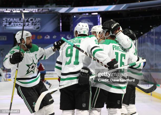 Alexander Radulov of the Dallas Stars celebrates with Jamie Benn Tyler Seguin, Miro Heiskanen and Joe Pavelski after Radulov scored in the first...