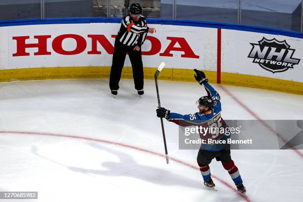 Andre Burakovsky of the Colorado Avalanche celebrates after scoring a goal against the Dallas Stars during the first period in Game Seven of the...