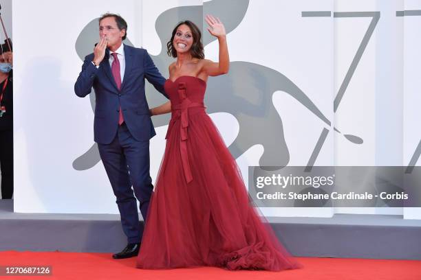 Francesco Boccia and Nunzia De Girolamo walk the red carpet ahead of the movie "Padrenostro" at the 77th Venice Film Festival at on September 04,...