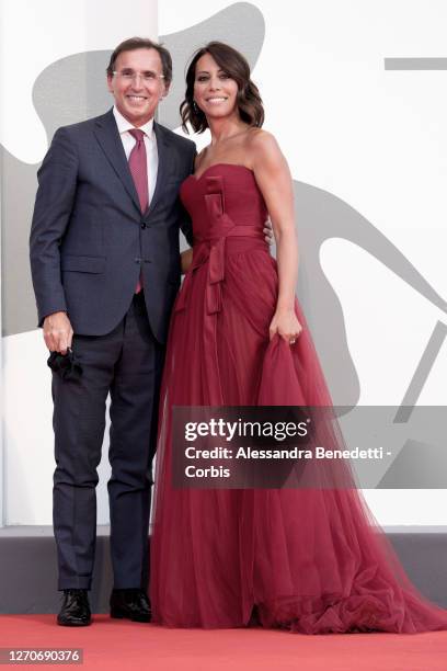 Nunzia De Girolamo and Francesco Boccia walk the red carpet ahead of the movie "Padrenostro" at the 77th Venice Film Festival at on September 04,...