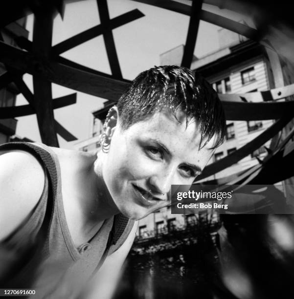 Lead singer Dolores O'Riordan of the Irish rock band The Cranberries poses for a portrait in front of a city sculpture circa June, 1995 in New York...