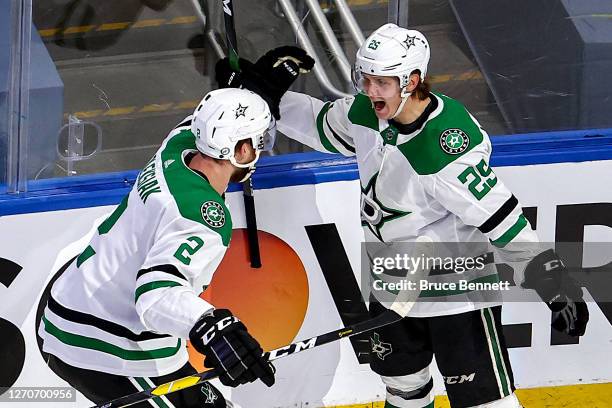 Joel Kiviranta of the Dallas Stars is congratulated by his teammate, Jamie Oleksiak after scoring the game-winning goal against the Colorado...