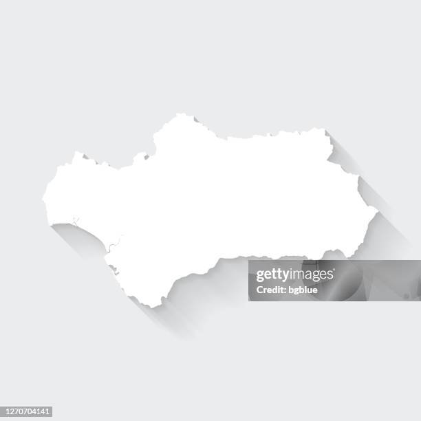 andalusien karte mit langem schatten auf leerem hintergrund - flat design - andalusia map stock-grafiken, -clipart, -cartoons und -symbole