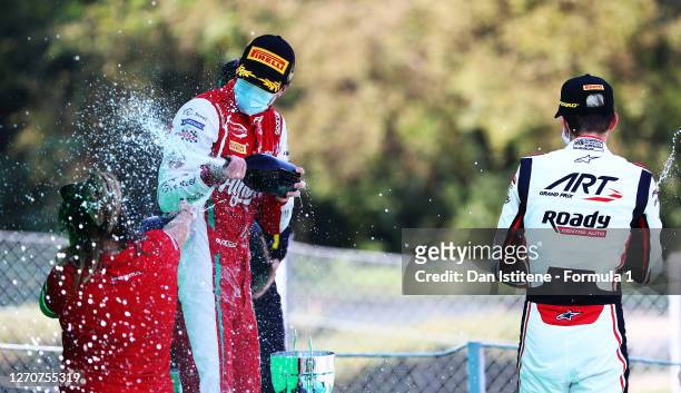 Race winner Frederik Vesti of Denmark and Prema Racing, second placed Theo Pourchaire of France and ART Grand Prix and third placed Oscar Piastri of...