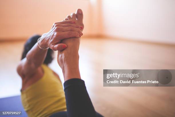 yoga indoor - soles pose stock pictures, royalty-free photos & images