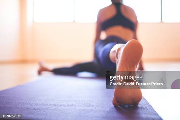 yoga indoor - soles pose stock pictures, royalty-free photos & images