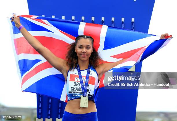 In this handout image provided by British Athletics, Gold Medalist, Morgan Lake of Great Britain poses during the medal ceremony for the Women's High...