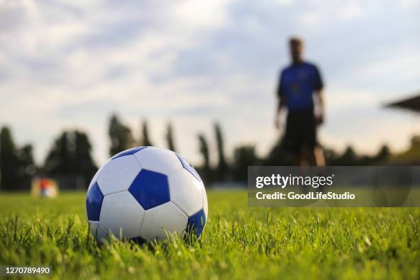 free kick - football player silhouette stock pictures, royalty-free photos & images