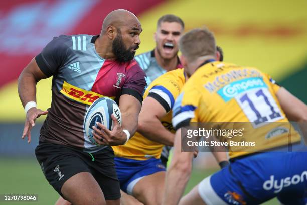 Paul Lasike of Harlequins takes on Ruaridh McConnochie of Bath Rugby during the Gallagher Premiership Rugby match between Harlequins and Bath Rugby...