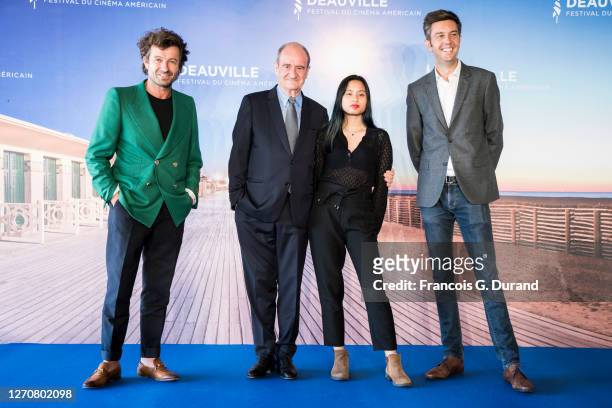 Philippe Lezin, Pierre Lescure and his daughter Anna, and Maxime Switek attend the "Pierre & Lescure" photocall at 46th Deauville American Film...