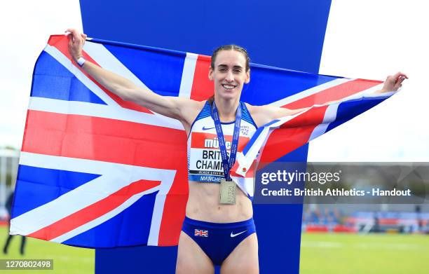 In this handout image provided by British Athletics, Gold Medalist, Laura Weightman of Great Britain poses during the medal ceremony for the Women's...