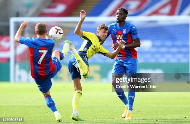 Jesper Lindstrom of Brondby IF is tackled by Max Meyer of Crystal Palace during a Pre-Season Friendly match between Crystal Palace and Brondby IF at...