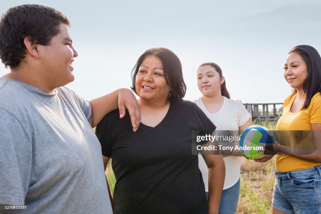 Mother with her son and two daughters