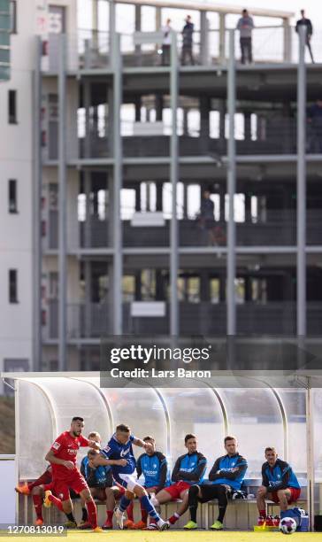 Bastian Oczipka of Schalke is challenged by Baris Ekincier of Bochum during the pre-season friendly match between FC Schalke 04 and VfL Bochum at...