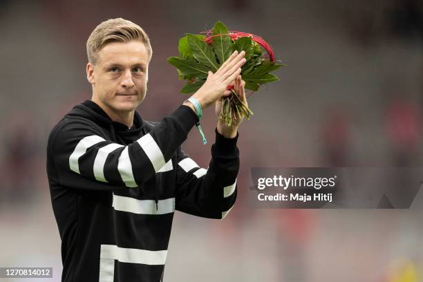 Former Union Berlin player Felix Kroos shows appreciation to the fans during farewell at the pre-season friendly match between 1. FC Union Berlin and...