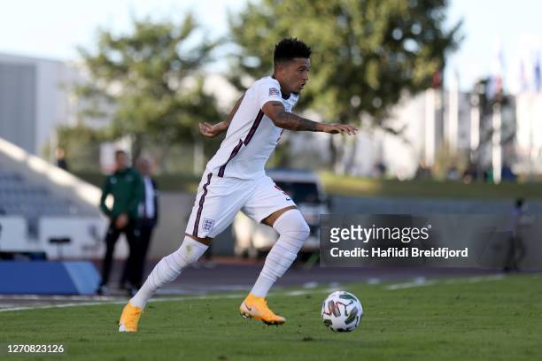 Jadon Sancho of England runs with the ball during the UEFA Nations League group stage match between Iceland and England at Laugardalsvollur National...