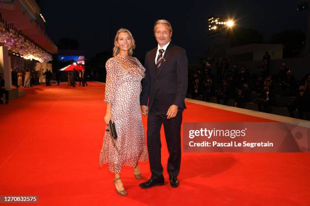 Hanne Jacobsen and Mads Mikkelsen walk the red carpet of the Kineo Prize at the 77th Venice Film Festival on September 05, 2020 in Venice, Italy.