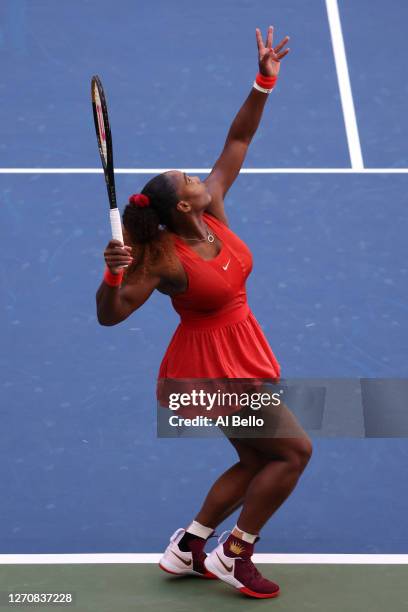 Serena Williams of the United States serves during her Women’s Singles third round match against Sloane Stephens of the United States on Day Six of...