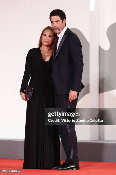 Sabrina Knaflitz and Alessandro Gassmann walk the red carpet ahead of the movie "Mandibules" at the 77th Venice Film Festival on September 05, 2020...