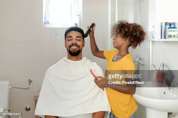 customer satisfaction is her priority - beard trimmer stock pictures, royalty-free photos & images