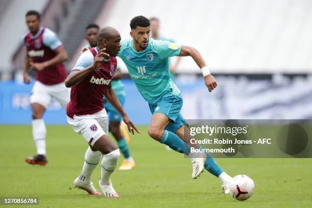 Angelo Ogbonna of West Ham United and Dominic Solanke of Bournemouth during pre-season friendly Betway Cup match between West Ham United and AFC...