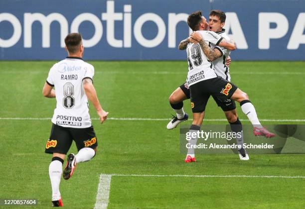 Gustavo Mosquito and Fagner of Corinthians celebrate their team's first goal of their team during the match against Botafogo as part of the...