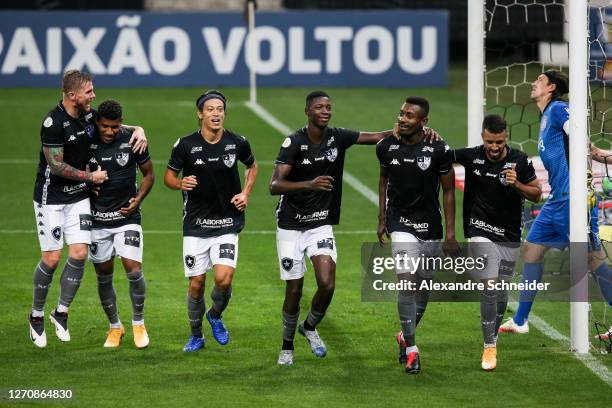 Players of Botafogo celebrate the second goal of their team during the match against Corinthians as part of the Brasileirao Series A at Arena...