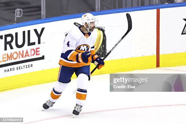 Andy Greene of the New York Islanders celebrates after scoring a goal against the Philadelphia Flyers during the first period in Game Seven of the...