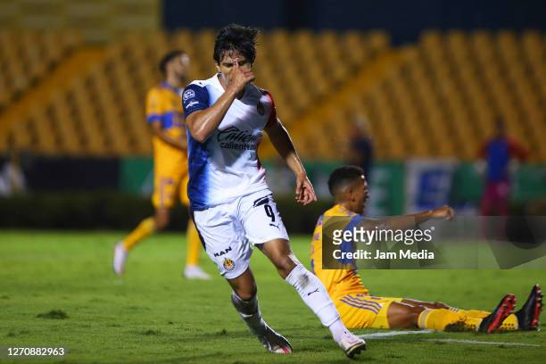 Jose Macias of Chivas celebrates after scoring the second goal of his team during the 8th round match between Tigres UANL and Chivas as part of the...