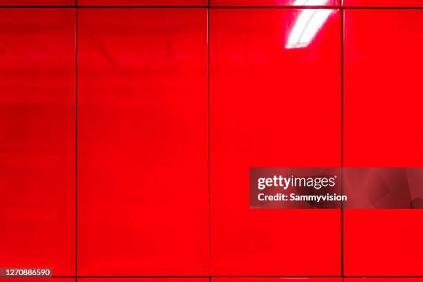 red wall in subway station - chinese red wall stock pictures, royalty-free photos & images