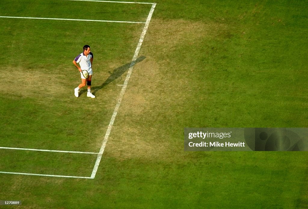 1992:  John McEnroe of the USA in action during Wimbledon in London, England. \ Mandatory Credit: Mi