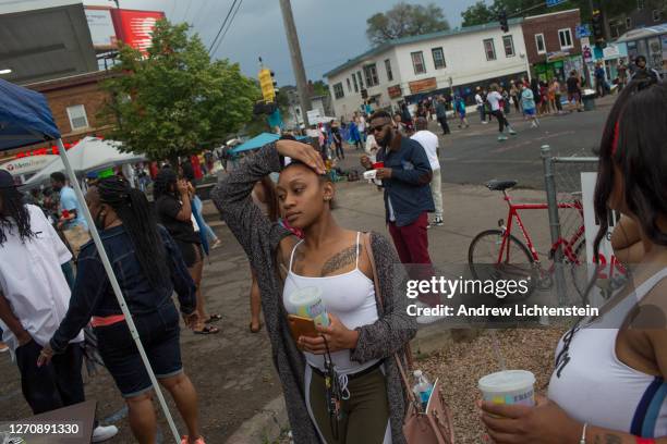 Crowds gather at the memorial site where George Floyd was killed, to pay their respects and demonstrate against police brutality, June 6, 2020 in...
