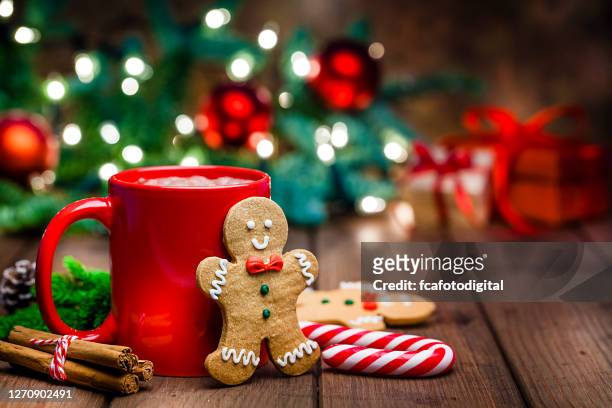 gingerbread cookie and hot chocolate for christmas - christmas stock pictures, royalty-free photos & images