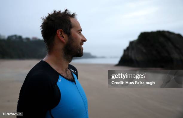 General view of North Beach Tenby, despite the race being cancelled due to Coronavirus Precautions an athlete in his wetsuit visited at the original...