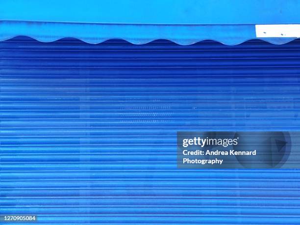 blue shop shutter with awning - shutter stock pictures, royalty-free photos & images